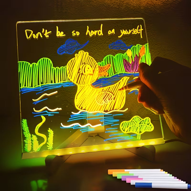 Child using LED luminescent drawing board educational toy UAE